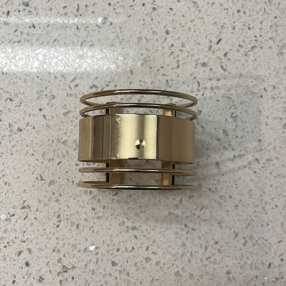 Stylish Shiny Aldo Gold Slip On Bangle Bracelet With Cut Outs - Picture 6 of 7